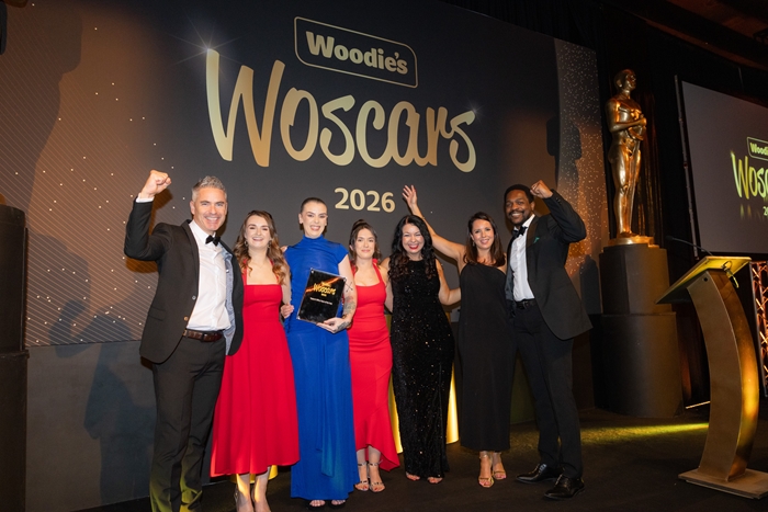 Signpost of Woodie’s Celebrate Colleagues at 9th Annual Woscars Event
